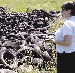Becky Quinlan, of Endpoint Environmental LLC, calibrates the TIRe Model by recording the location of known tire piles