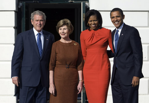 President George W. Bush and Mrs. Laura Bush and President-elect Barack Obama and Mrs. Michelle Obama pause for photographs Monday, Nov. 10, 2008, after the Obama's arrival at the South Portico of the White House. White House photo by Chris Greenberg