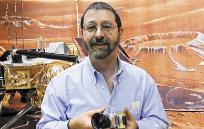 Malin with the prototype of one of his cameras in 1999. The flight version was lost on the ill-fated Mars Polar Lander later that year.