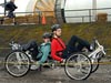 Two students pedal a moonbuggy