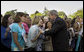 President George W. Bush greets guests at the conclusion of the Military Spouse Day celebration Tuesday, May 6, 2008, at the White House. Begun in 1984, the day was established to acknowledge the profound impact military spouses have on service members and to honor their volunteer service in educational, social and community endeavors. White House photo by Joyce N. Boghosian