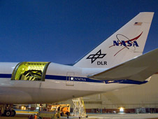 SOFIA's infrared telescope in the rear fuselage during nighttime testing.