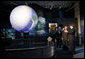 President George W. Bush views a display in the new Sant Ocean Hall as he is escorted by Christian Samper, Director of the Smithsonian Museum of Natural History, right, Friday, Sept. 26, 2008, during his visit to the Smithsonian Museum of Natural History in Washington, D.C. White House photo by Eric Draper