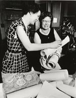 Margaret Mead and Rhoda Metraux looking at American children's drawings of Sputnik