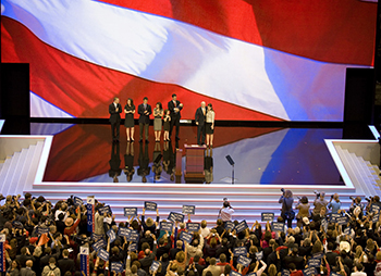 Sen. John McCain joins the Palin family on stage