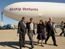NASA Ames Center Director, Dr. S. Pete Worden, Brian and Alexandra Hall, and Colonel (USMC Retired) William Moffett III enjoyed the celebration of Airship Ventures Dedication at the Moffett Field 75th Anniversary.