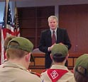 This is an image of Congressman Baird speaks to a local Boy Scout troop about the importance of community service.