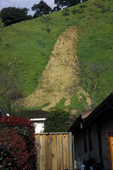 Photograph of debris flows that damaged homes in the San Francisco Bay area during the 1998 El Nino storms.