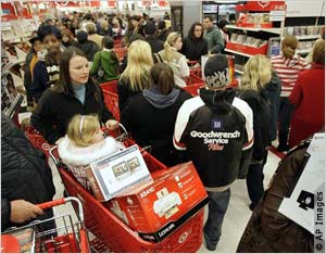 Shoppers fill aisles in store (AP Images)