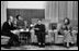 President Gerald R. Ford and Mrs. Betty Ford meet with Chinese Vice Premier Deng Xiao Ping, during an informal meeting Dec. 3, 1975 in Peking, China. Deng’s interpreter is seen background-left.