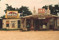 A crossroads store, bar, juke joint, and gas station in the cotton plantation area