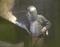 Welder making boilers for a ship, Combustion Engineering Company