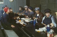 Women workers employed as wipers in the roundhouse having lunch