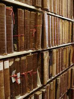 photogpaph of library book stacks containing old Serial Set volumes.