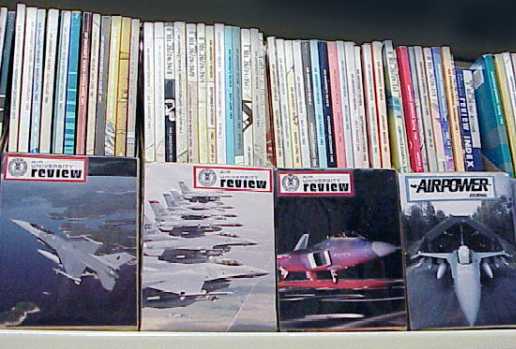 photograph of book stacks, with some Air Force publications displayed face front