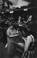 Margaret Mead with a secretary in a storage room adjacent to her tower office at the American Museum of Natural History,