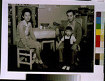 [Mr. & Mrs. Henry J. Tsurutani and baby Bruce, Manzanar Relocation Center, California]
