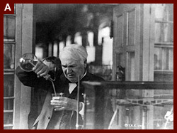 Thomas Edison, half-length portrait, facing left and looking down into glass, experimenting in his laboratory. 1920