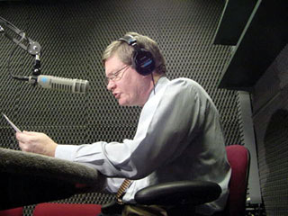 Tim speaks during a radio interview