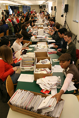 Volunteers join with the American Red Cross and Pitney Bowes in Washington, DC on December 6 to sort holiday cards as part of 'Holiday Mail for Heroes'.  Cards will be delivered to American service members, veterans and military families in the United States and around the world.
