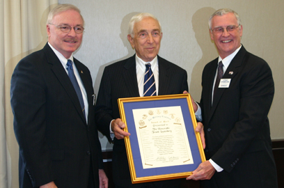 Senator Lautenberg receives the Award of Merit from the Military Coalition's Co-Chairmen, Joseph Barnes (left) and Col. Steven Strobridge, USAF, Ret., at a ceremony on Capitol Hill. Senator Lautenberg was honored by the coalition - which is composed of 35 military, veterans and uniformed services organizations representing more than six million members around the world - for his work to keep healthcare costs for servicemen and women, veterans and military families from increasing this year. (October 2, 2007)