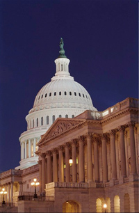 The Capitol dome at night.