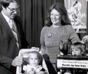 Then-State Senator Bill Sederburg (now President of Ferris State University) and then-State Representative Debbie Stabenow (with their children) led the passage of Michigan's child car safety law, one of the first in the nation.