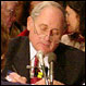 Photo of Senator Levin Speaking at a Podium