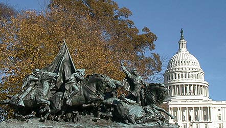 Photo of the Capitol with statue in foreground