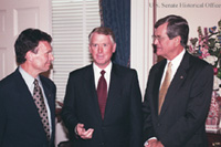 Vice President Quayle chats with Senators Tom Daschle (left) and Trent Lott (right) in the Office of the Majority Leader.