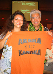 Council for Native Hawaiian Advancement President, Robin Danner, holds a t-shirt in support of the Native Hawaiian Government Recognition bill.
