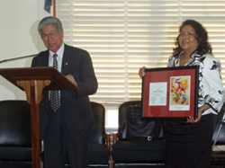 Inter Tribal Council of Arizona President Vivian Juan-Suanders presents Senator Akaka a gift in recognition for his efforts 