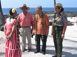 Senator Akaka talks with Honaunau resident Aunty Rachel Kalili, during ceremonies expanding Puuhonua O Honaunau National Historical Park.  Also present are Daniel K. Akaka, Jr. and Park Superintendent Geri Bell.  The addition doubles the park's size. 