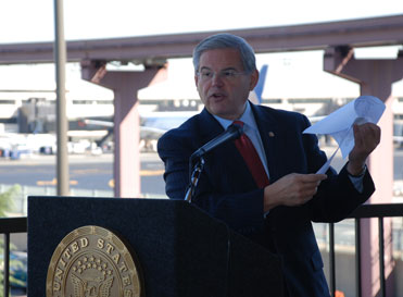 Senator Menendez calls on airlines to reduce added surcharges -- Newark Liberty Airport