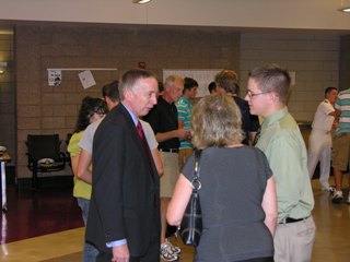 thumbnail image: Congressman Davis speaking with students interested in attending the military academies.