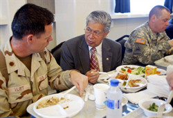 U.S. Sen. Daniel K. Akaka, D-Hawaii, has lunch with U.S. military personnel in Baghdad's heavily fortified Green Zone in Iraq on Sunday, June 11, 2006. (AP Photo/Mohammed Jalil, Pool)
