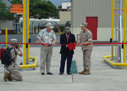 Senator Akaka cuts a ribbon opening a corrosion prevention vehicle wash at Kaneohe Marine Corps Base.  The wash will address salt blowing off Kaneohe Bay, reducing repairs and enhancing readiness by keeping weapons and transport systems operational.  Senator Akaka is the Chairman of the Senate Armed Services Subcommittee on Readiness and Management Support.   
