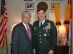 Senator Akaka meets with Lieutenant General William Caldwell, Commanding Officer of the Army's Combined Arms Center, to discuss the newly released version of Field Manual 3-0 -- the US Army's capstone operational doctrine document.