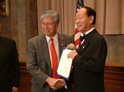 Senator Akaka congratulates Dr. Ramon Sy recipient of The Jefferson Award for community and public service in America.  Dr. Sy is founder of the Aloha Medical Mission.