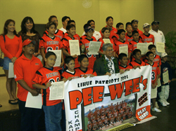 Senator Akaka congratulates the Lihue Patriots, Hawaii's first Pop Warner Football Championship team.
