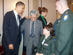 Senators Akaka and Barack Obama (D-IL) greet Army Major Tammy Duckworth before the March 17, 2005 Veterans’ Affairs Hearing, 