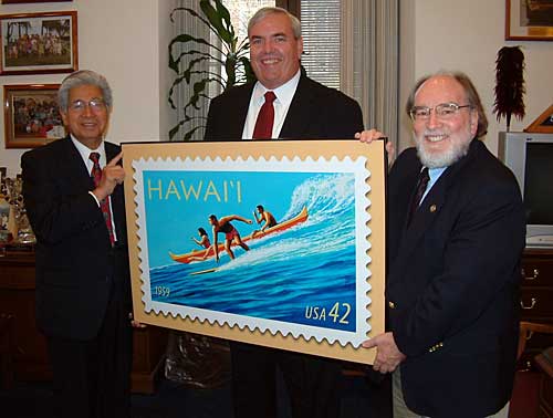 U.S. Sen. Daniel Akaka, left, and U.S. Rep. Neil Abercrombie, right, got a preview yesterday of Hawaii's 50th-anniversary statehood stamp from U.S. Postmaster General John Potter. The stamp by Herb Kawainui Kane will be out in the summer.