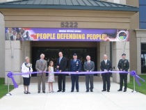 Sen. Sessions cutting the ribbon at the Commissioning Ceremony for Von Braun II building at Redstone Arsenal in Huntsville with Mayor Loretta Spencer, Congressman Bud Cramer, Sen. Richard Shelby and his granddaughter, Anna, Lt Gen Trey Obering, III, Congressman Robert Aderholt, and BG Joseph Schroedel. (7/30/07)