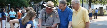 Park Ranger assisting a family from Texas (NPS Photo by J. Feeney)