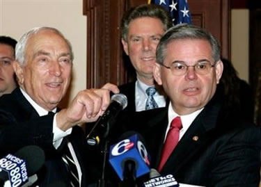 Senators Lautenberg and Menendez and Representative Frank Pallone take questions from the press at the State House in Trenton during a press conference on Lautenberg’s emergency Medicare reimbursement legislation. Governor Corzine also participated in the event. January 25, 2006.