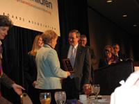 Senator Crapo receives an award from the National School Boards Association for his efforts to improve the No Child Left Behind law.