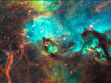 Dust and glowing gases with a mass of bright stars