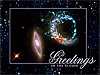 Galaxies with the words Greetings of the Season superimposed
