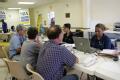 Wapello, Iowa, June 28, 2008 -- Residents of Wapello and nearby towns discuss their options and apply for FEMA assistance at the Disaster Recovery...