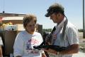 Wapello, Iowa, June 28, 2008 --Tanya Purdy, 49, answers the questions of the FEMA housing inspector who has arrived to evaluate the damage to her ...